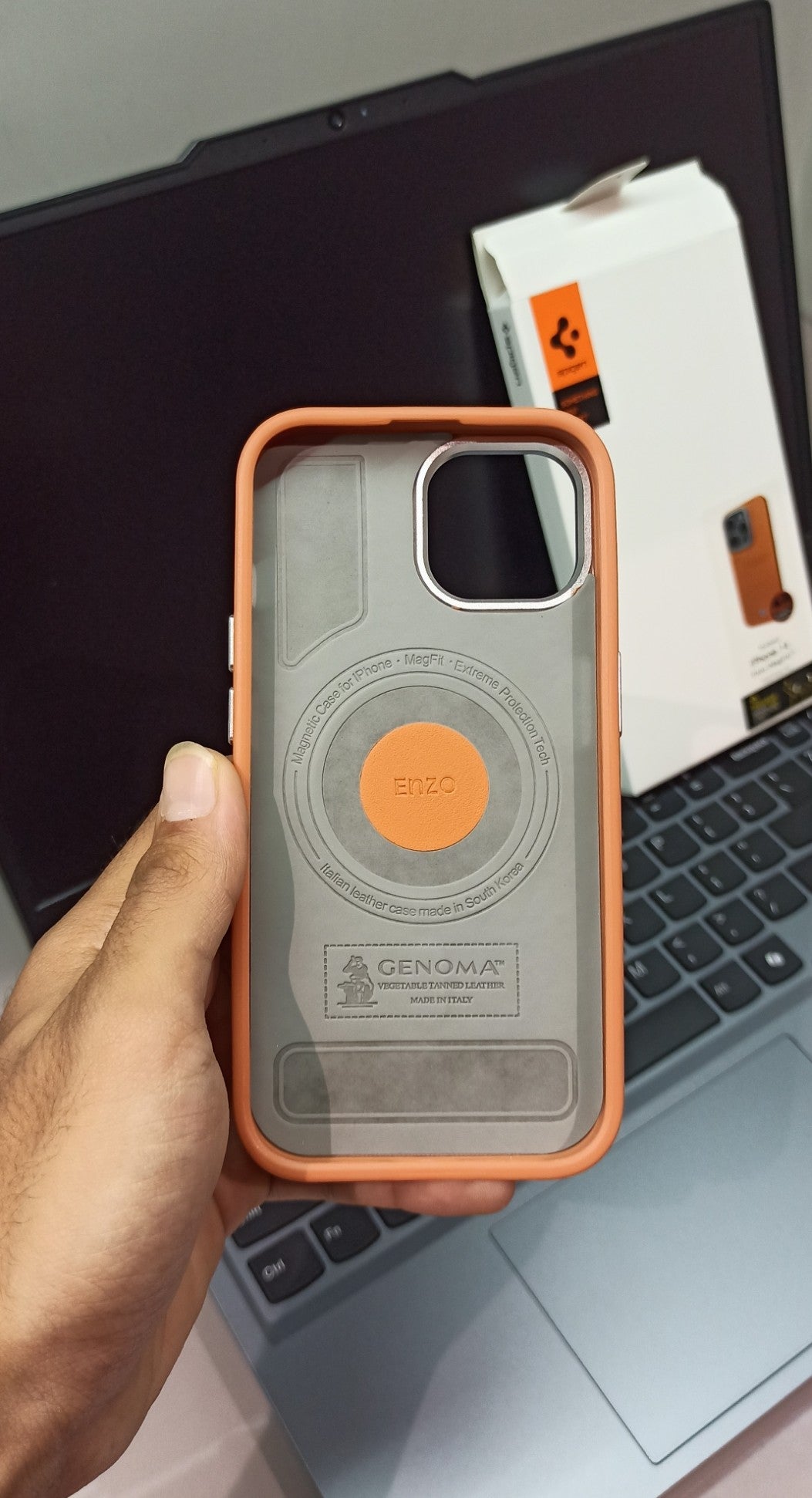 Spigen Premium Orange Leather Finish iPhone 14 Case with Metal Detailing