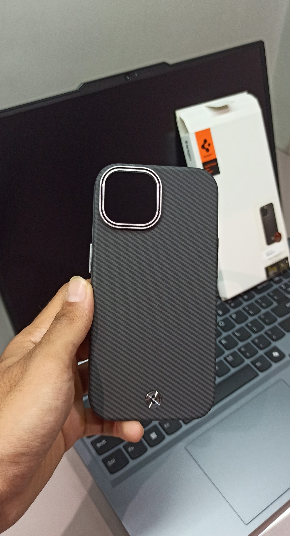 Spigen Carbon Fiber Texture iPhone 14 Case with Metal Detailing